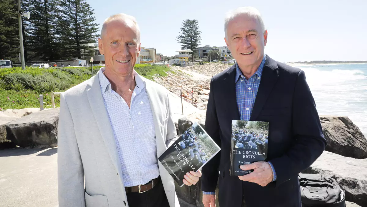 Authors Mark Goodwin and Carl Scully holding book 'The Cronulla Riots' picture by John Veage